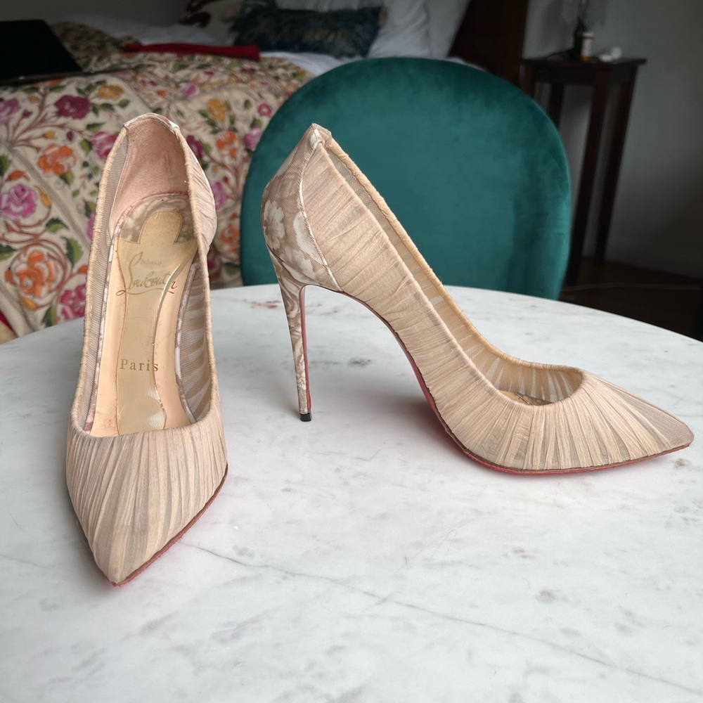Nude tulle Louboutins with rose print